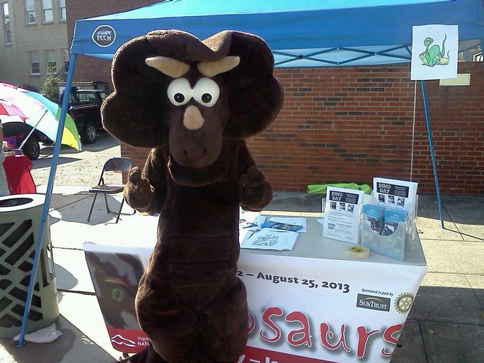 Cera the Triceratops is greeting visitors at the Oktoberfest event in Uptown Martinsville Uptown