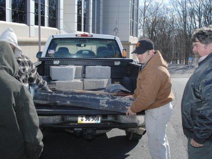 These pictures show the arrival at the Virginia Museum of Natural History of a recently donated ...